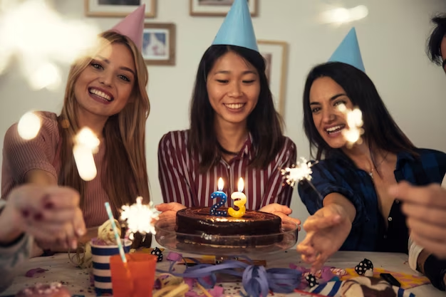 A girl celebrating her 23rd birthday with her friends.