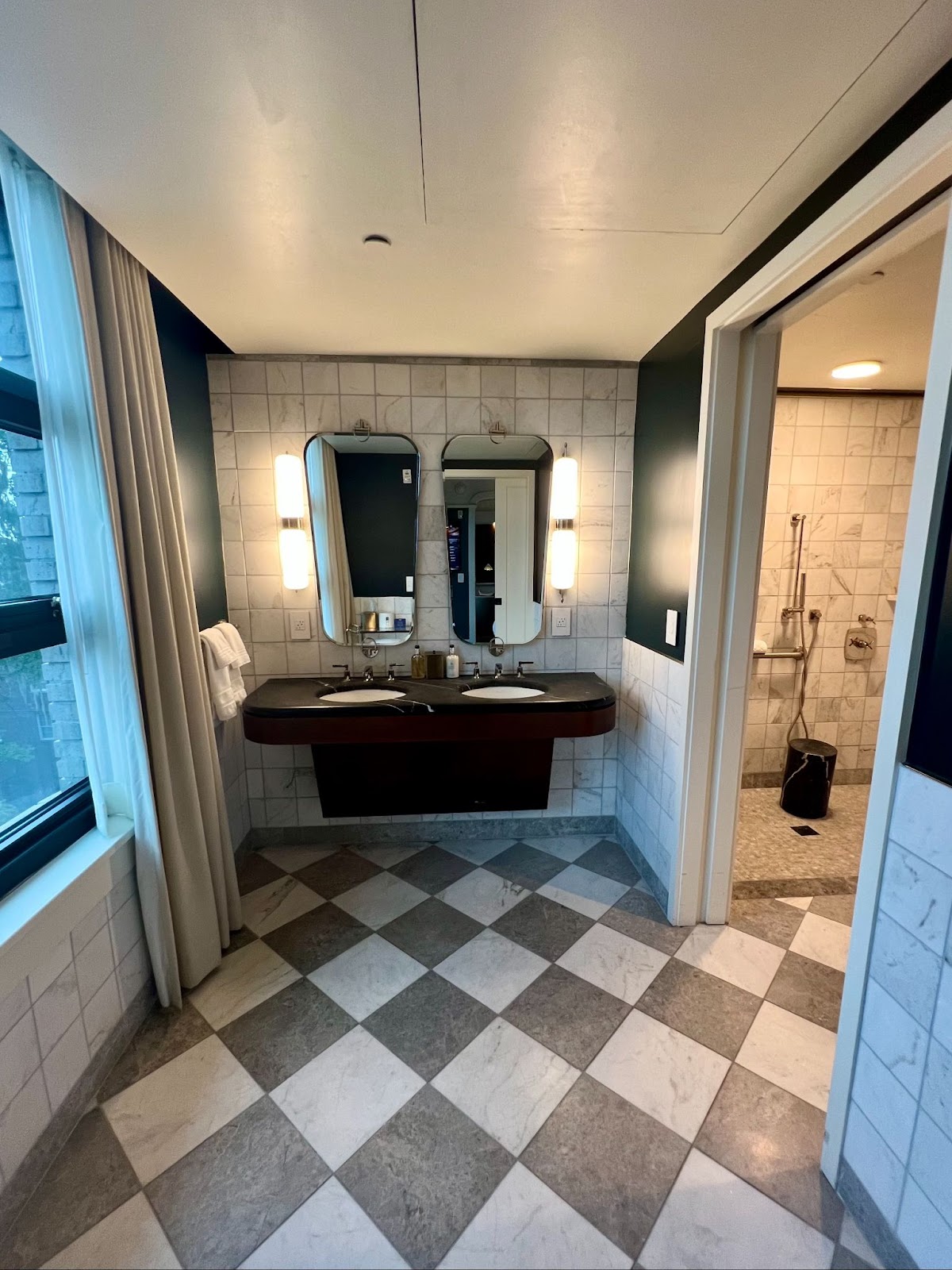 a bathroom with a mirror and a sink