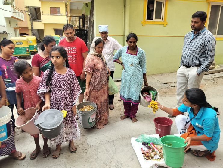 Sahaas volunteers conducting a waste management session in Yelachenahalli.