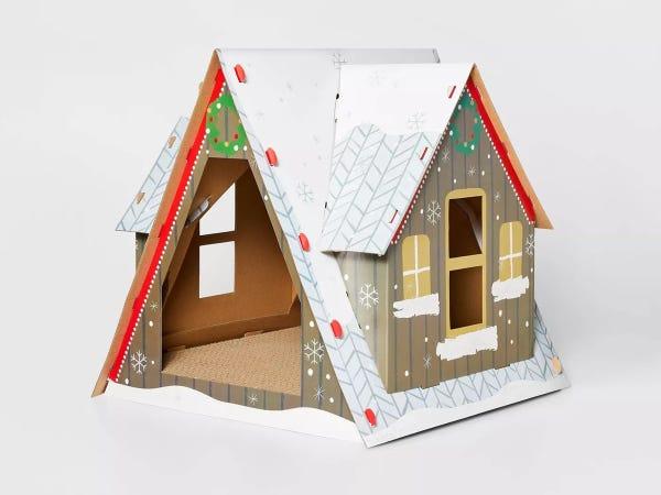 a cardboard cat scratcher designed as an a-frame Ski Chalet is the best gift for a cat lover