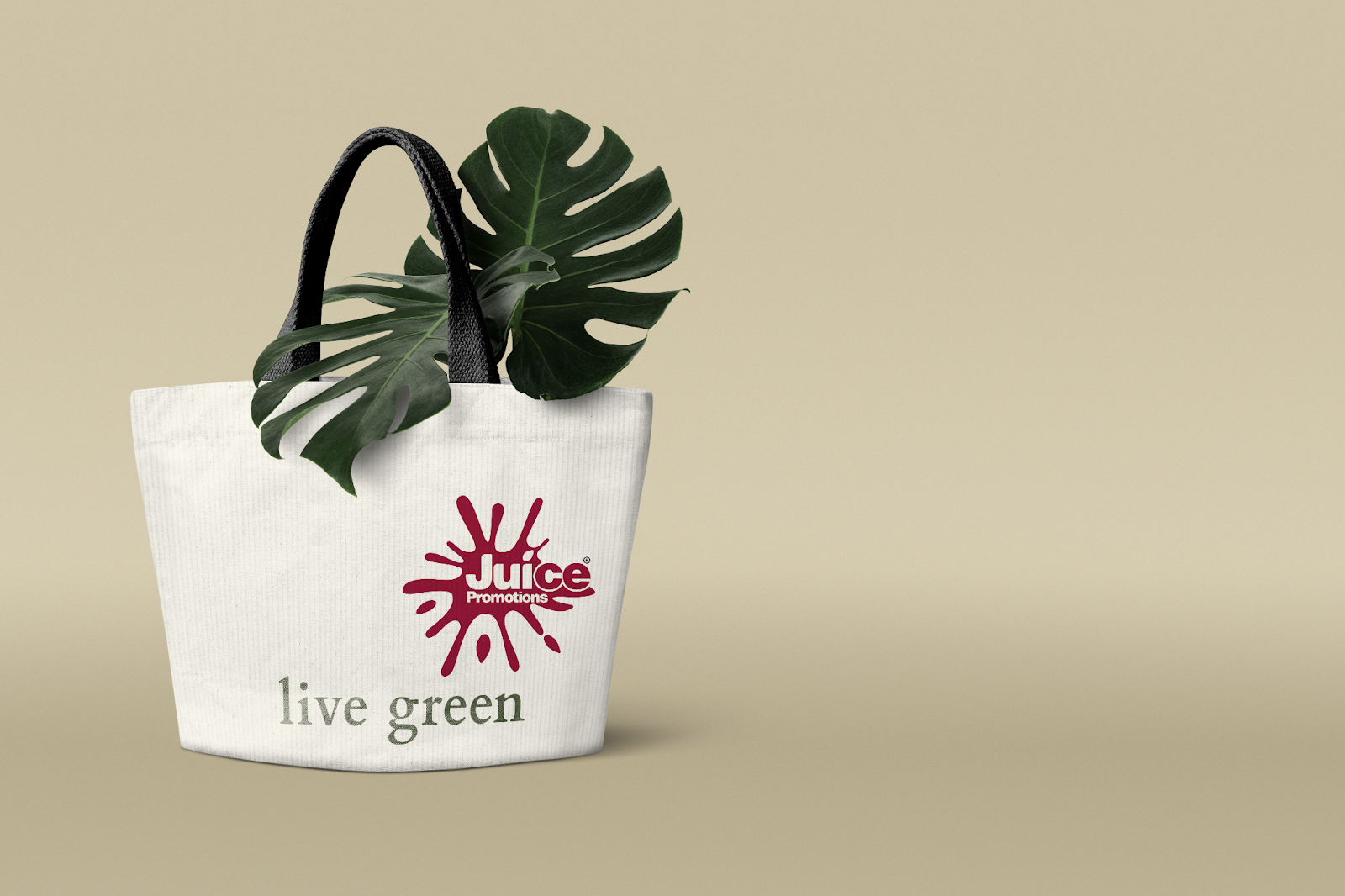 Image of Tote Bag with Juice Promotions logo and caption live green against a light brown background via Freepik.