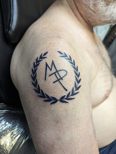 Explore state of georgia tattoo ideas, creative tattoo ideas in Columbus, available at Infamous Ink Tattoos and Piercings