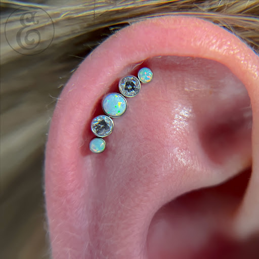 Explore arm tattoo cover up ideas, creative tattoo ideas in Worcester, available at Elegance Piercing & Tattoo Inc.