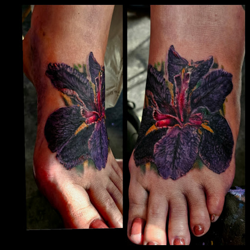 Explore cover up lower back tattoo ideas, creative tattoo ideas in Toledo, available at Cross Over Tattoo Studio