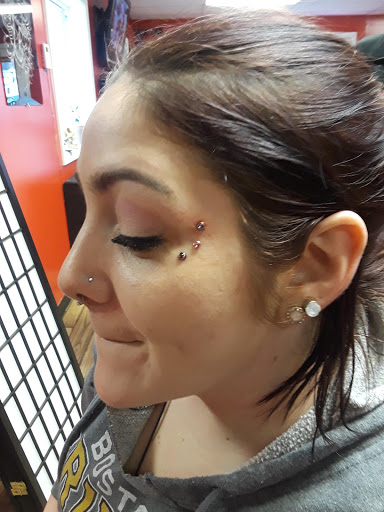 Explore black tattoo ideas for men, creative tattoo ideas in Newport, available at T N T Explosive Tattoo