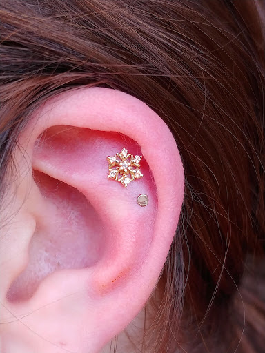 Explore childhood cancer tattoo ideas, creative tattoo ideas in Eau Claire, available at Steel N Ink Body Piercing