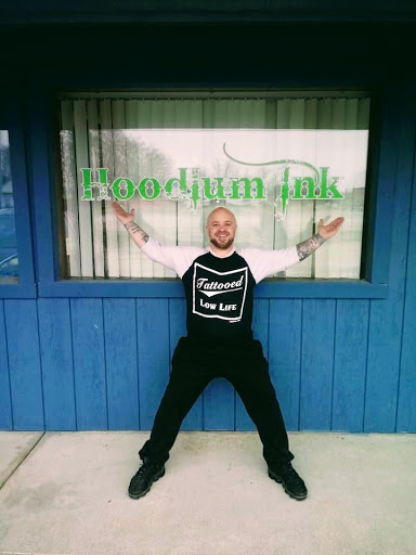 Explore first born tattoo ideas, creative tattoo ideas in Angola, available at Hoodlum Ink