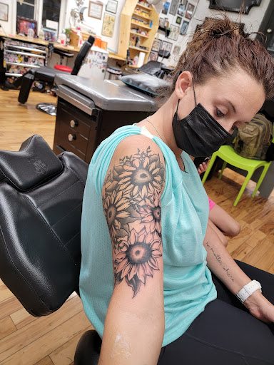 Explore mermaid tattoo ideas for females, creative tattoo ideas in Morristown, available at Ink Dreams Tattoo