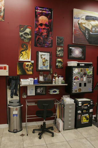 Explore barb wire tattoo ideas, creative tattoo ideas in Katy, available at Artistic Impressions Tattoo Studio