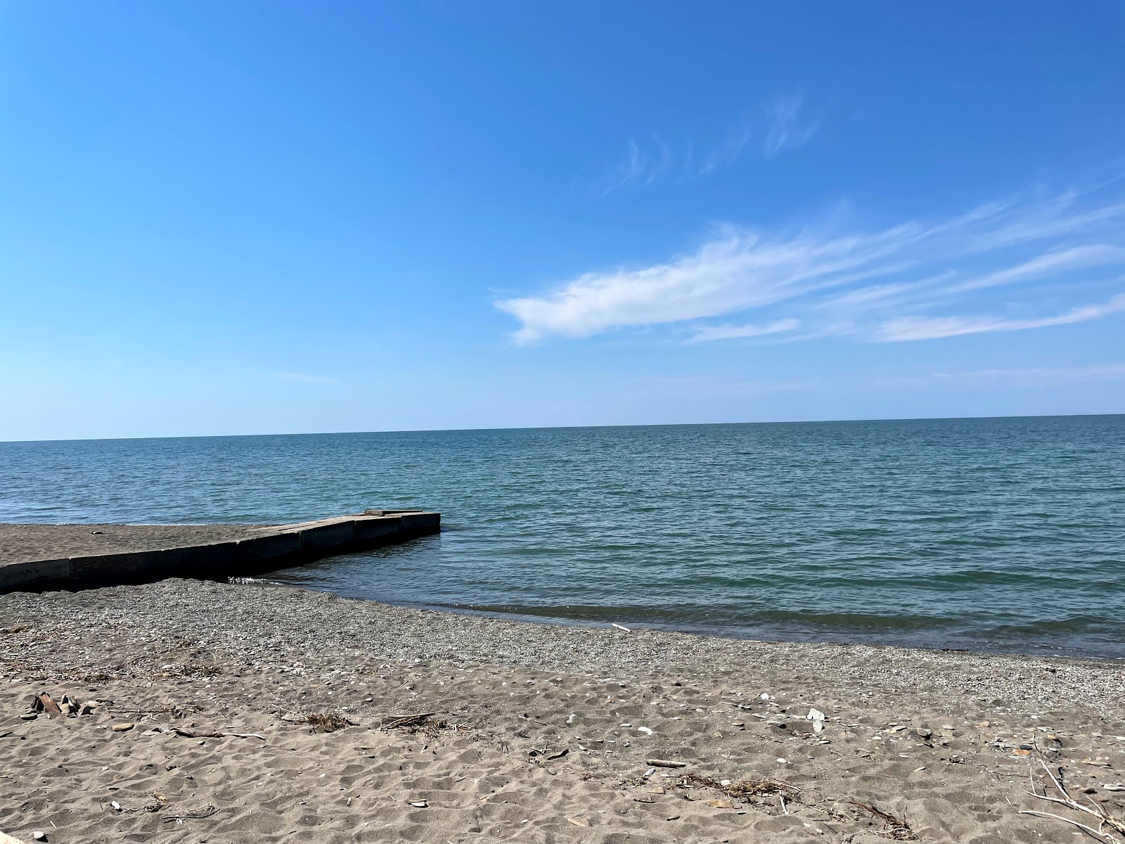 Raccoon Beach的照片 带有碧绿色纯水表面
