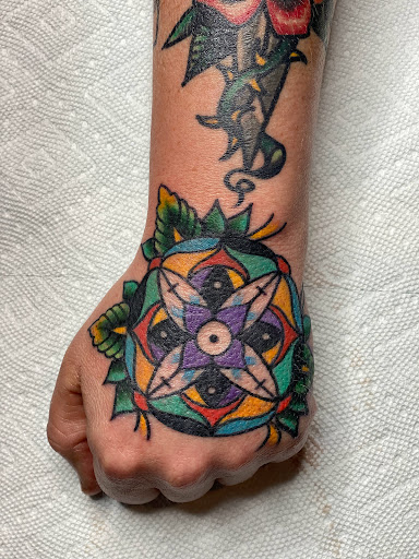 Explore name tattoo ideas on arm, creative tattoo ideas in White River Junction, available at Standard Company Tattoo