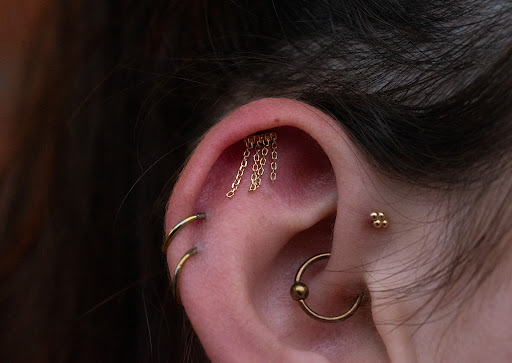 Explore forehead tattoo ideas, creative tattoo ideas in Roanoke, available at Clove Piercing & Fine Jewelry