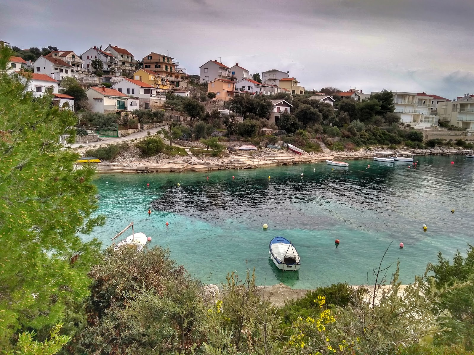 Foto de Kanica beach con cala pequeña