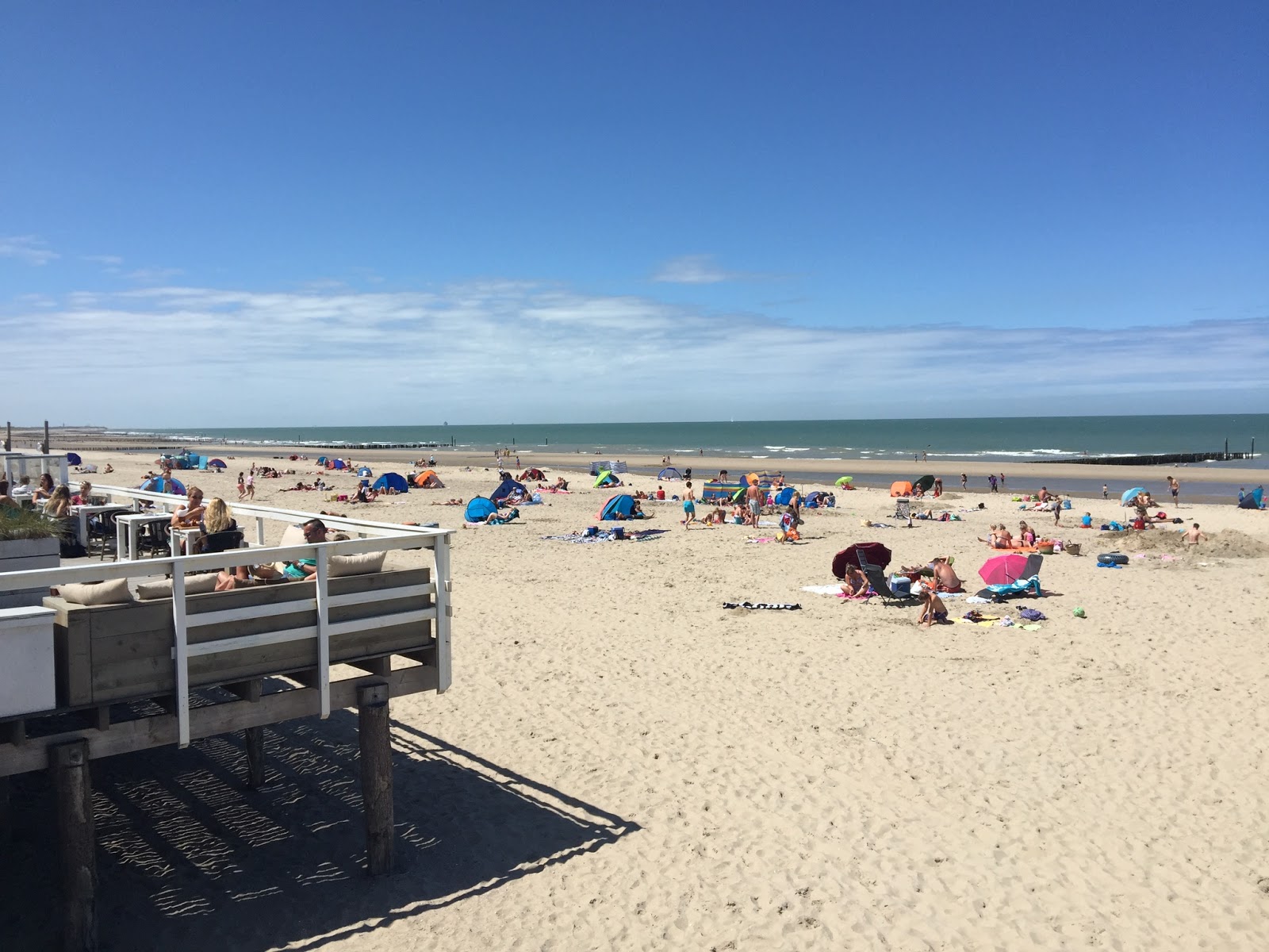 Groede Zeeland Strand的照片 带有米色沙子表面