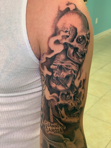 Explore caterpillar tattoo ideas, creative tattoo ideas in Ocala, available at The Tattoo Gallery of Ocala LLC