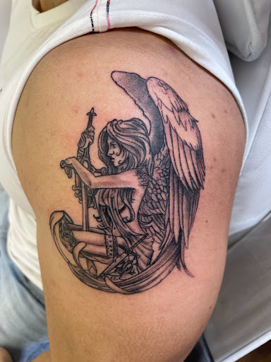 Explore ryuk tattoo ideas, creative tattoo ideas in Rogers, available at Ink Solutions Tattoo