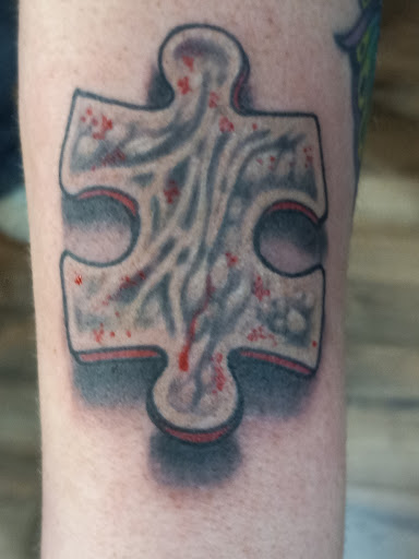 Find surrealism tattoo ideas for your next unique tattoo in Columbus at Sweet Baby Octane