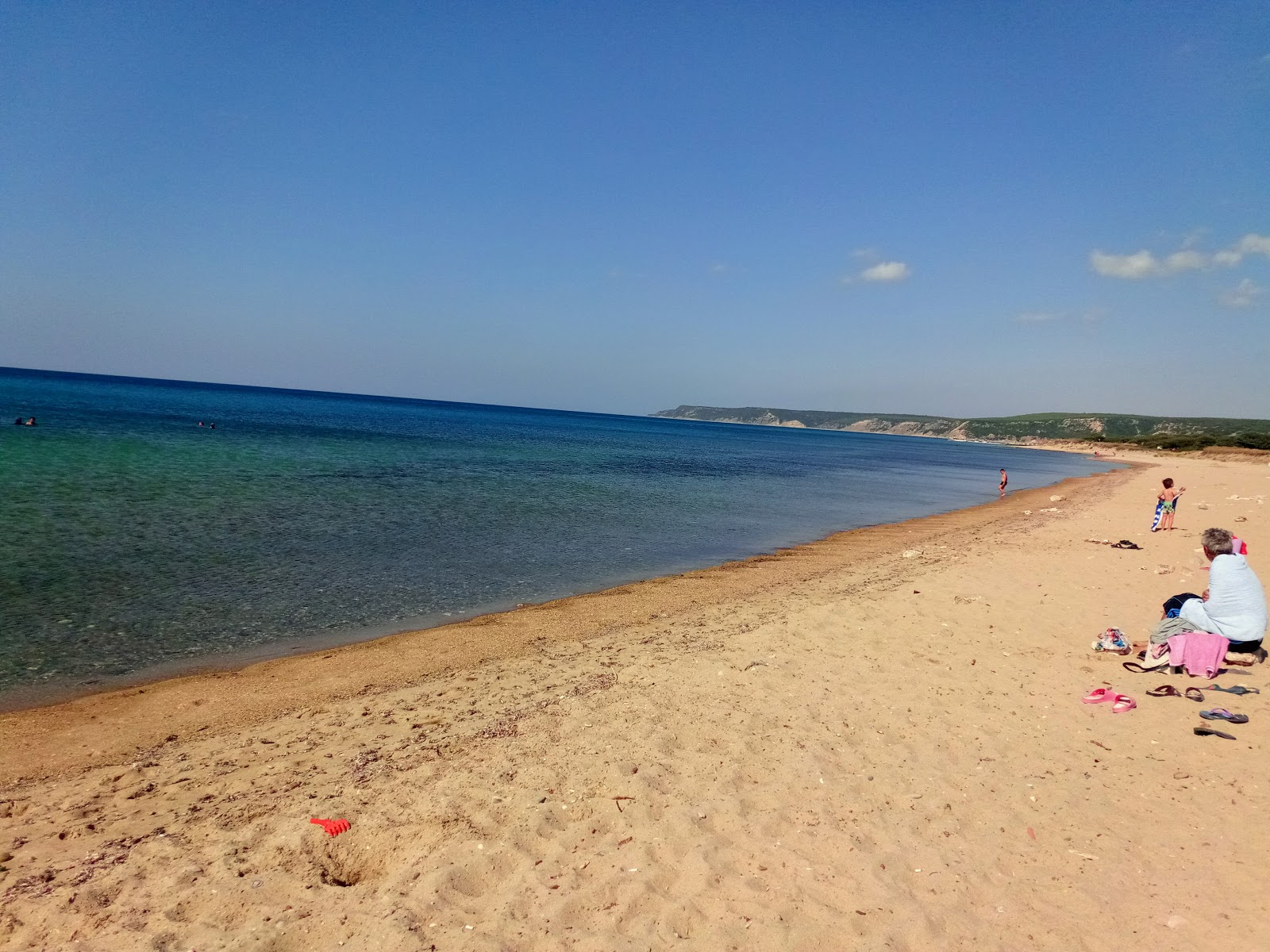 Photo of Altunhan beach II with blue pure water surface