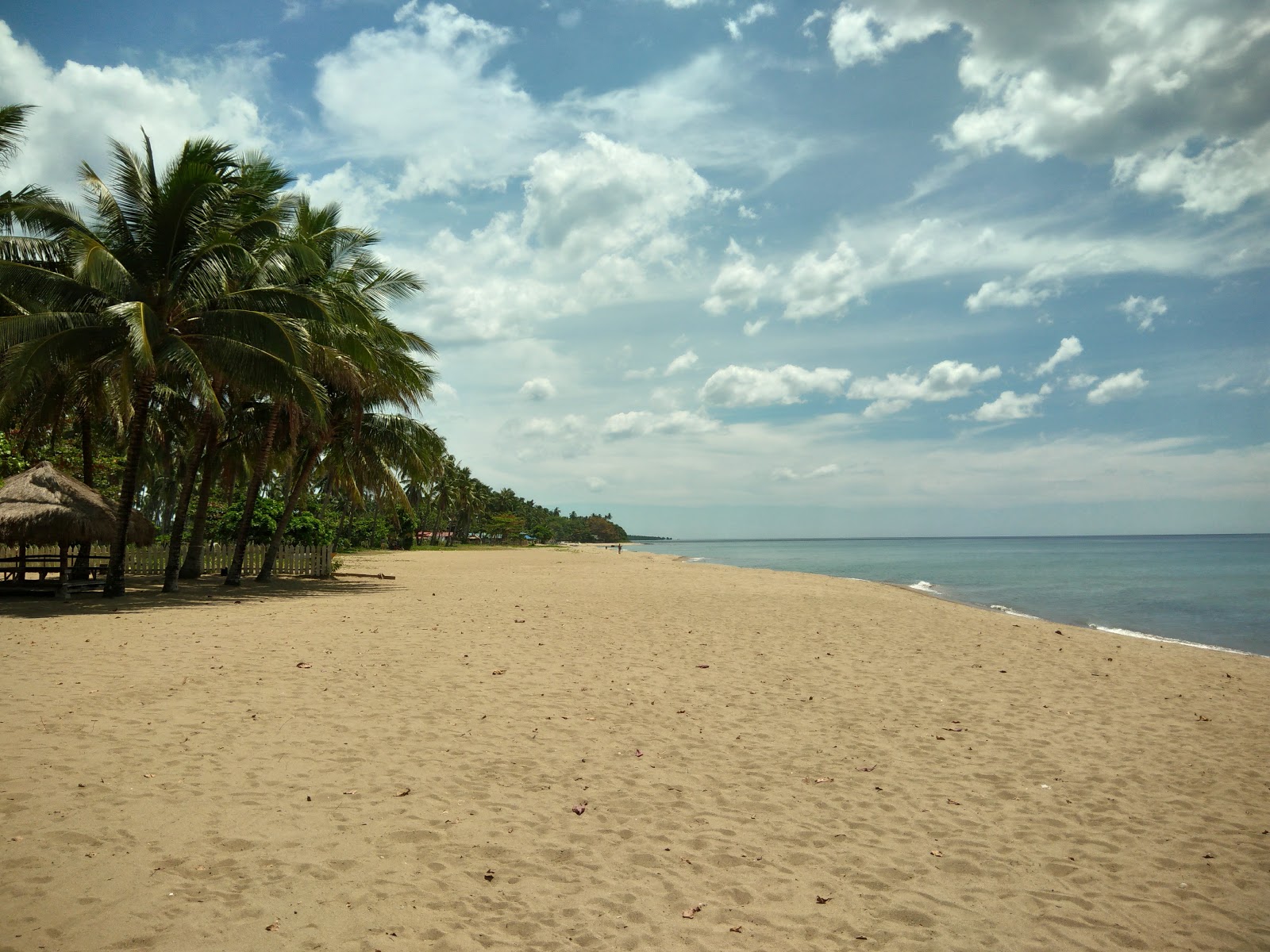 Photo de Hinoba-an Beach avec sable lumineux de surface