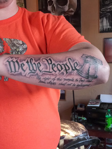 Explore mens western tattoo ideas, creative tattoo ideas in Roanoke, available at RailYard INK
