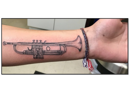 Explore wife tattoo ideas, creative tattoo ideas in Milwaukee, available at Bay Street Tattoo Co.