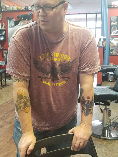 Explore tattoo sleeve ideas flowers, creative tattoo ideas in Westland, available at Suicide Kings Tattoo