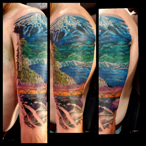 Find cool dog tattoo ideas for your next unique tattoo in Toledo at Cross Over Tattoo Studio