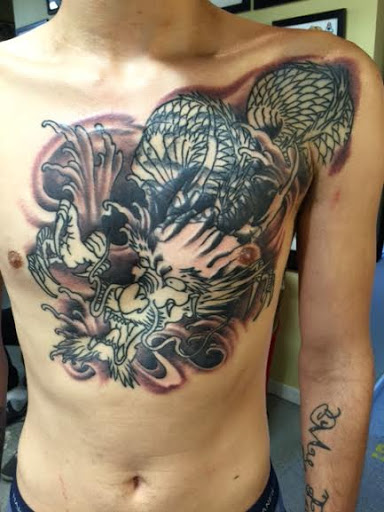 Explore eagle feather tattoo ideas, creative tattoo ideas in Newburgh, available at Millennium Tattoo