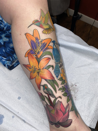 Explore saint michael tattoo ideas, creative tattoo ideas in West Point, available at Liquid Metal Tattoo & Body Piercing