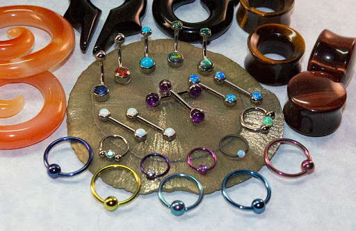 Explore barbed wire tattoo ideas, creative tattoo ideas in Omaha, available at Skin Deep Tattoo and Body Piercing