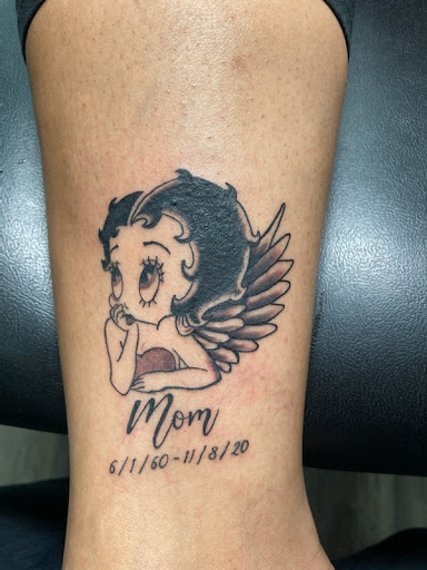 Explore feminine cross tattoo ideas, creative tattoo ideas in Kissimmee, available at Precision Ink Tattoo Company