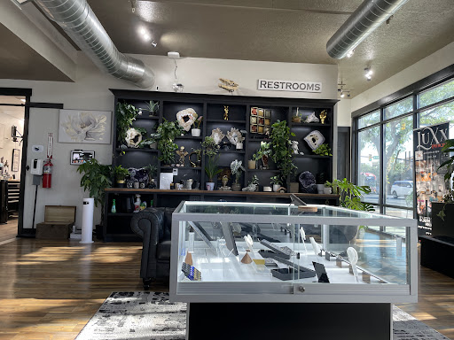 Explore behind ear tattoo ideas, creative tattoo ideas in Ogden, available at LuXx Piercing iNcisioN Piercing