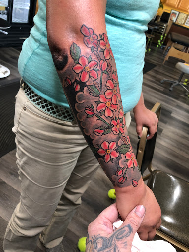 Find lesbian tattoo ideas for your next unique tattoo in Duluth at Gitchee Gumee Tattoo