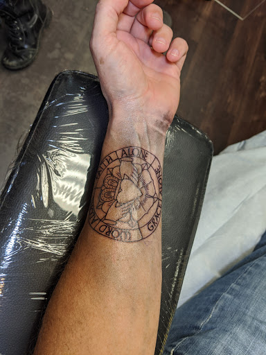 Explore new years tattoo ideas, creative tattoo ideas in Mchenry, available at Art and Soul Tattoo Company