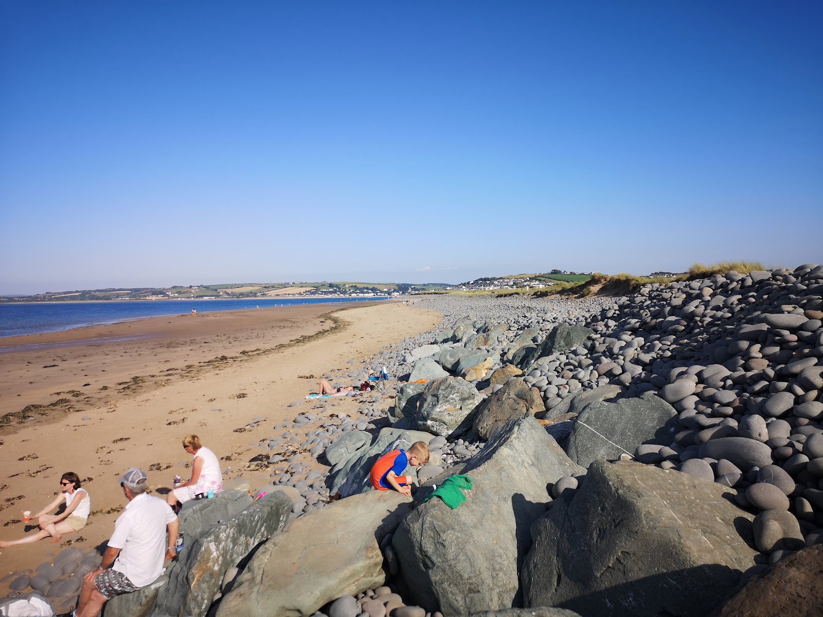 Foto di Greysands beach con una superficie del sabbia beige
