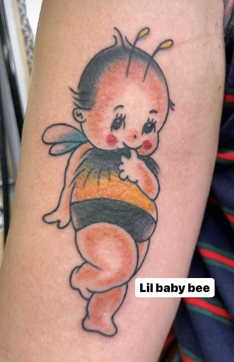 Explore tattoo face ideas, creative tattoo ideas in Baltimore, available at Rippd Canvas Tattoo Shop Artists Social Club