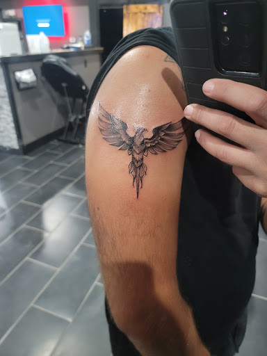 Explore men's knuckle tattoo ideas, creative tattoo ideas in Pensacola, available at Pensacola Tattoo Studio, Inc.