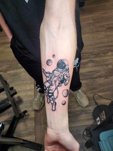 Explore skull rose tattoo ideas, creative tattoo ideas in Athens, available at United Ink Tattoos and Body Piercings