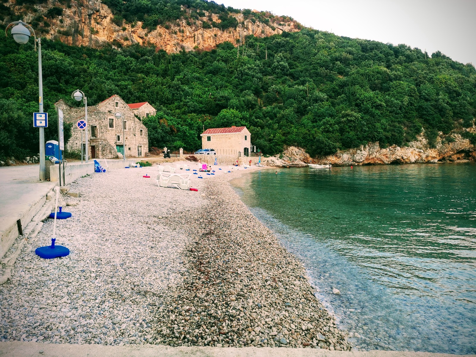 Photo of Brsecine Harbour with light pebble surface