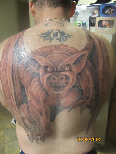 Tattoo Shop «The Shop», reviews and photos, 141 S Grand Ave, Fowlerville, MI 48836, USA