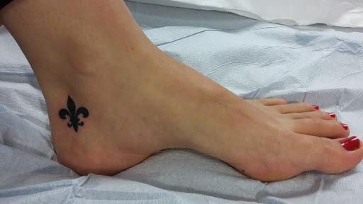 Tattoo Shop «THREE ANCHORS TATTOO», reviews and photos, 1662 State Rd, Cuyahoga Falls, OH 44223, USA