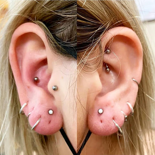 Explore female tattoo cover up ideas, creative tattoo ideas in Charleston, available at Exotic Impressions Body Piercing