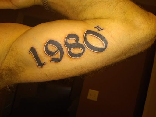 Explore dark skin male black skin tattoo ideas, creative tattoo ideas in Saint George, available at The Zion Tattoo Company