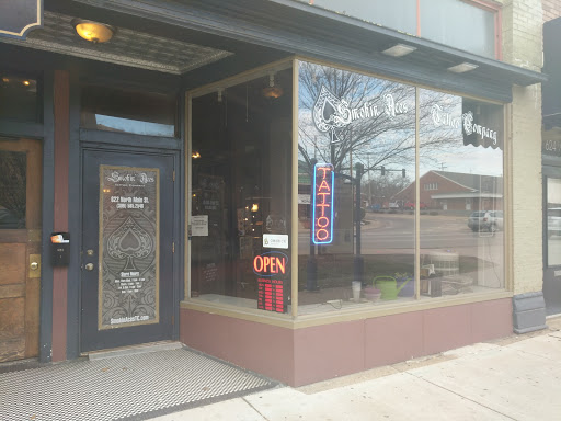 Explore roman numerals tattoo idea, creative tattoo ideas in Bloomington, available at Smokin Aces Tattoo Company