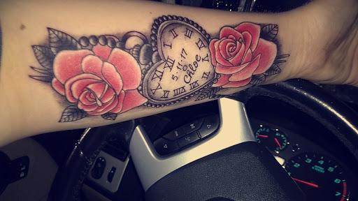 Explore vertical tattoo ideas, creative tattoo ideas in Park Hills, available at Body Designs Tattoo & Piercing