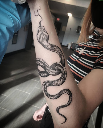 Explore cover up tattoo ideas male chest, creative tattoo ideas in Palm Harbor, available at Angry Owl Tattoo and Piercing