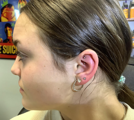 Explore tattoo of lips ideas, creative tattoo ideas in Whitehall, available at Beachside Tattoos & Smoke Shop