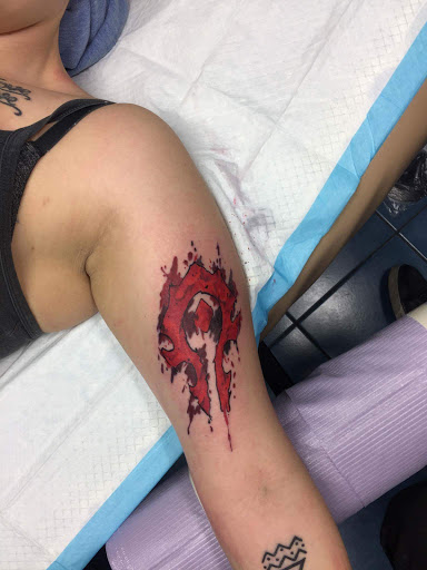 Find cute cat tattoo ideas for your next unique tattoo in Aurora at Ronin Tattoo Studio INC