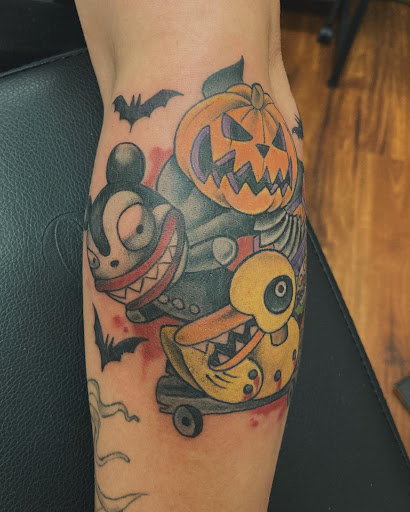 Explore lizard tattoo ideas, creative tattoo ideas in Connellsville, available at Sugar Hill Tattoo Studio