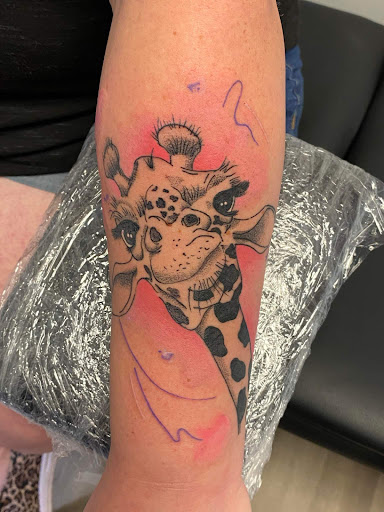 Find cowboy tattoo ideas for your next unique tattoo in Easley at Peach Pit Tattoo